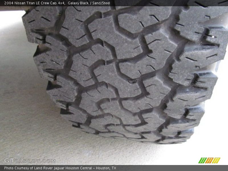 Galaxy Black / Sand/Steel 2004 Nissan Titan LE Crew Cab 4x4