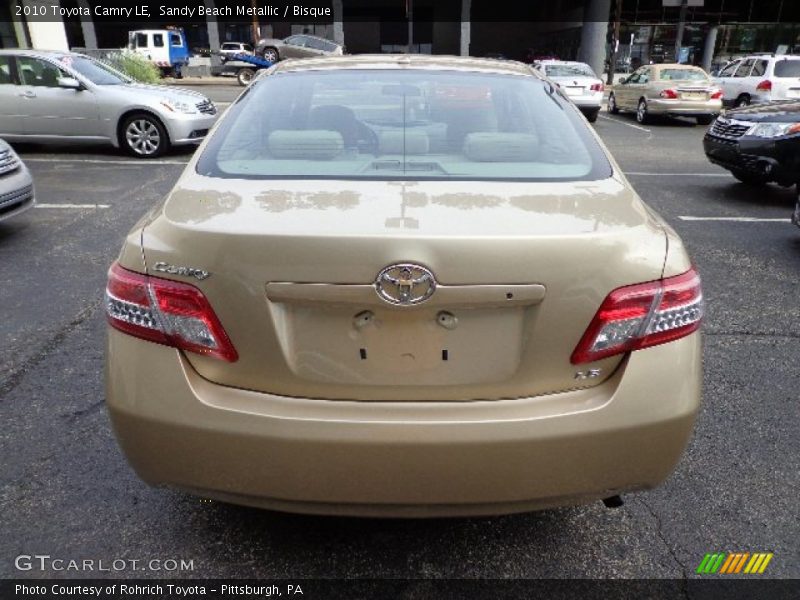 Sandy Beach Metallic / Bisque 2010 Toyota Camry LE