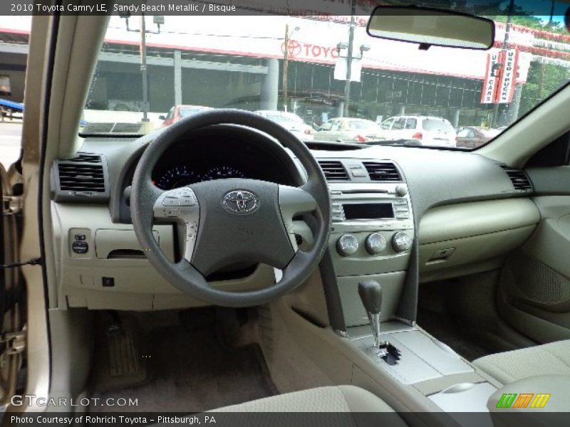 Sandy Beach Metallic / Bisque 2010 Toyota Camry LE