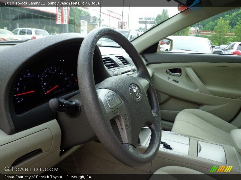 Sandy Beach Metallic / Bisque 2010 Toyota Camry LE