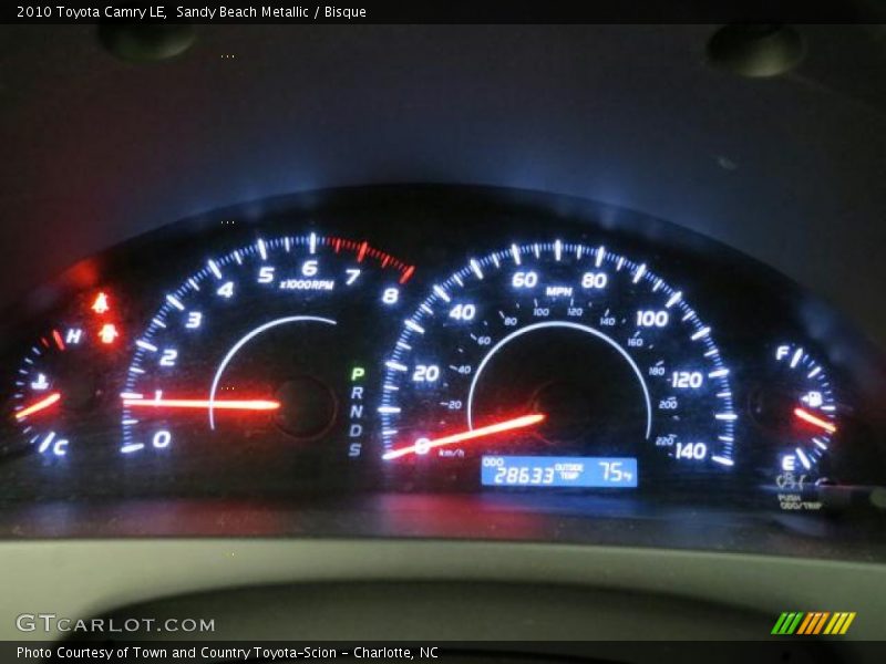 Sandy Beach Metallic / Bisque 2010 Toyota Camry LE