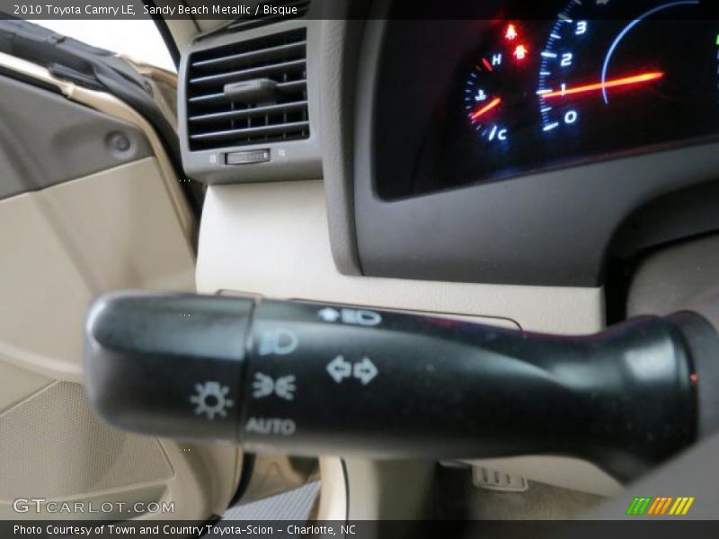 Sandy Beach Metallic / Bisque 2010 Toyota Camry LE
