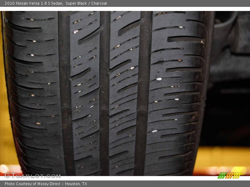 Super Black / Charcoal 2010 Nissan Versa 1.8 S Sedan