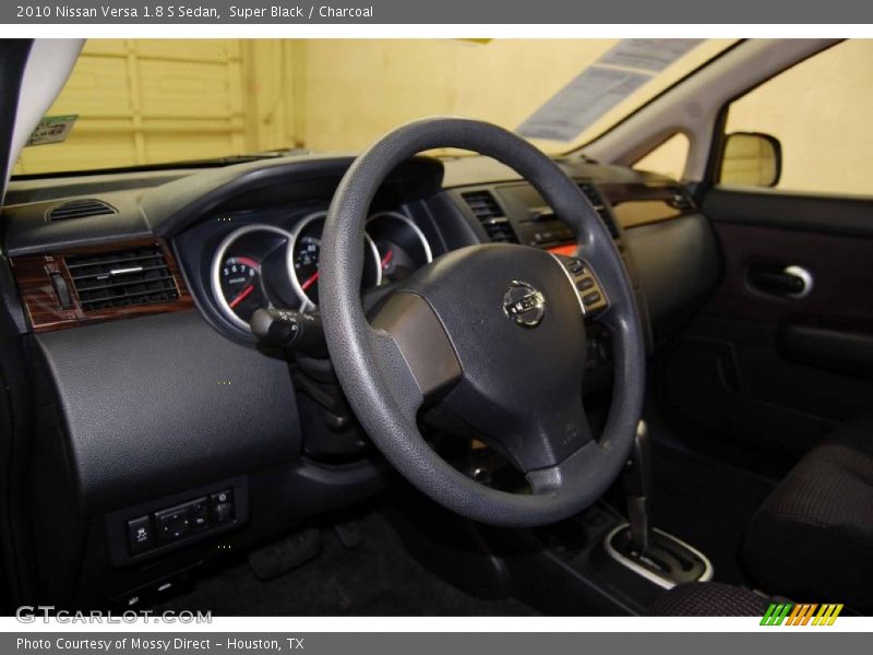 Super Black / Charcoal 2010 Nissan Versa 1.8 S Sedan