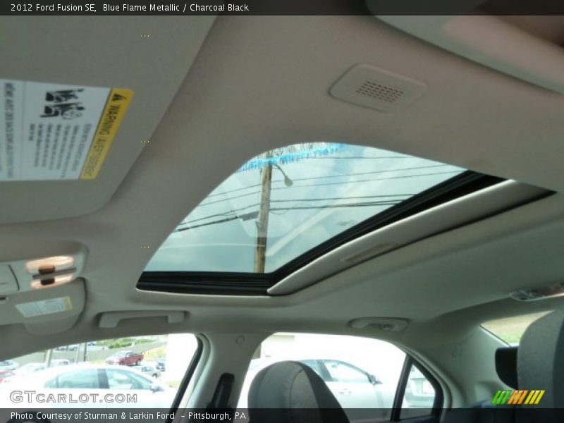 Blue Flame Metallic / Charcoal Black 2012 Ford Fusion SE