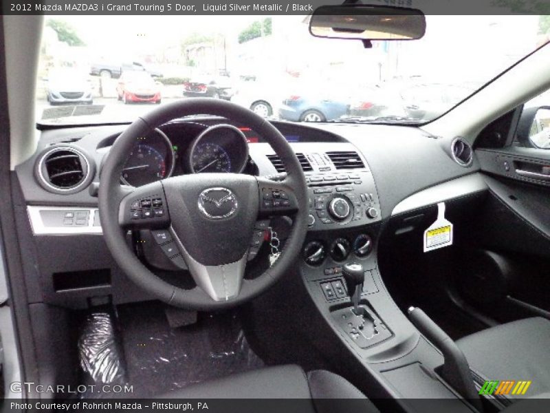 Dashboard of 2012 MAZDA3 i Grand Touring 5 Door