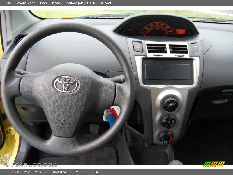 Yellow Jolt / Dark Charcoal 2009 Toyota Yaris 3 Door Liftback