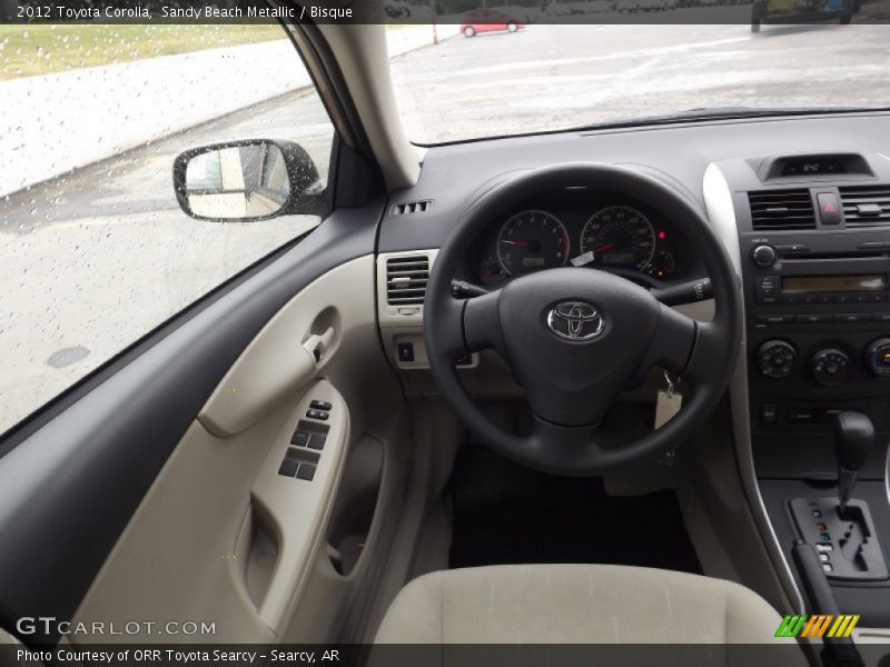 Sandy Beach Metallic / Bisque 2012 Toyota Corolla