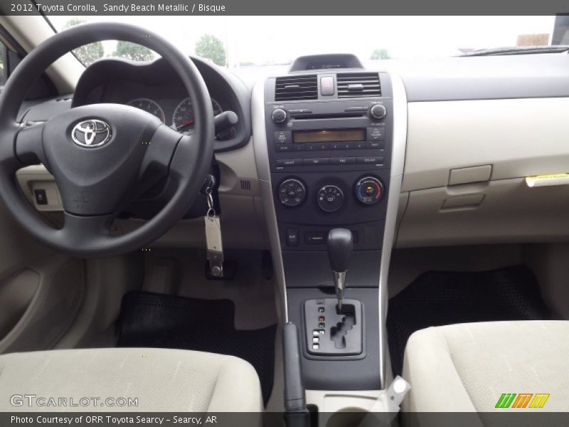 Sandy Beach Metallic / Bisque 2012 Toyota Corolla