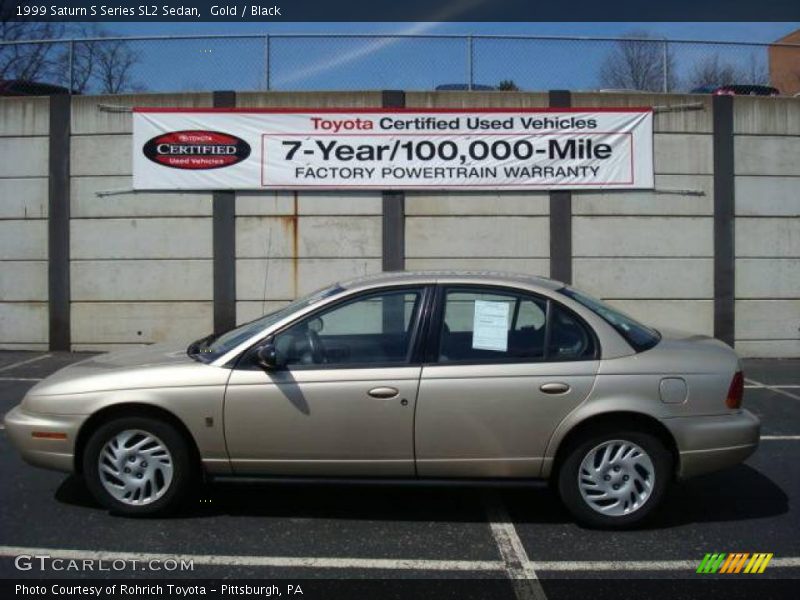 Gold / Black 1999 Saturn S Series SL2 Sedan