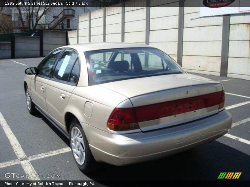 Gold / Black 1999 Saturn S Series SL2 Sedan