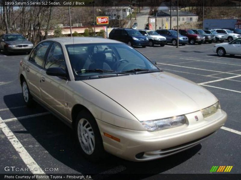 Gold / Black 1999 Saturn S Series SL2 Sedan