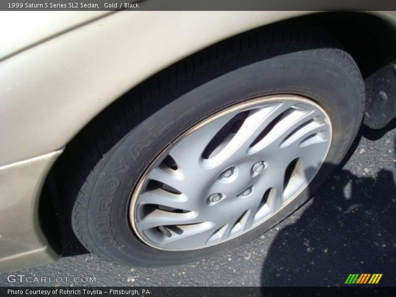 Gold / Black 1999 Saturn S Series SL2 Sedan
