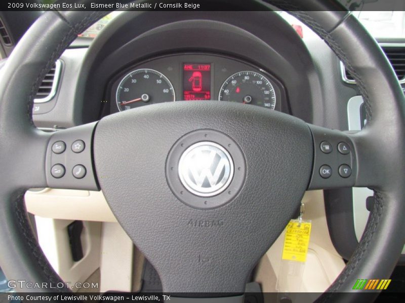 Eismeer Blue Metallic / Cornsilk Beige 2009 Volkswagen Eos Lux