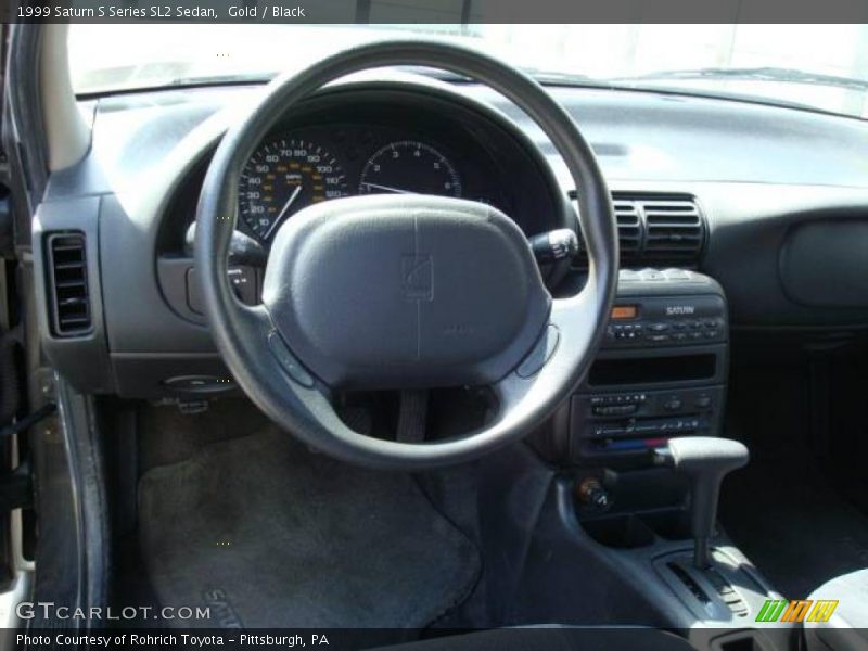 Gold / Black 1999 Saturn S Series SL2 Sedan