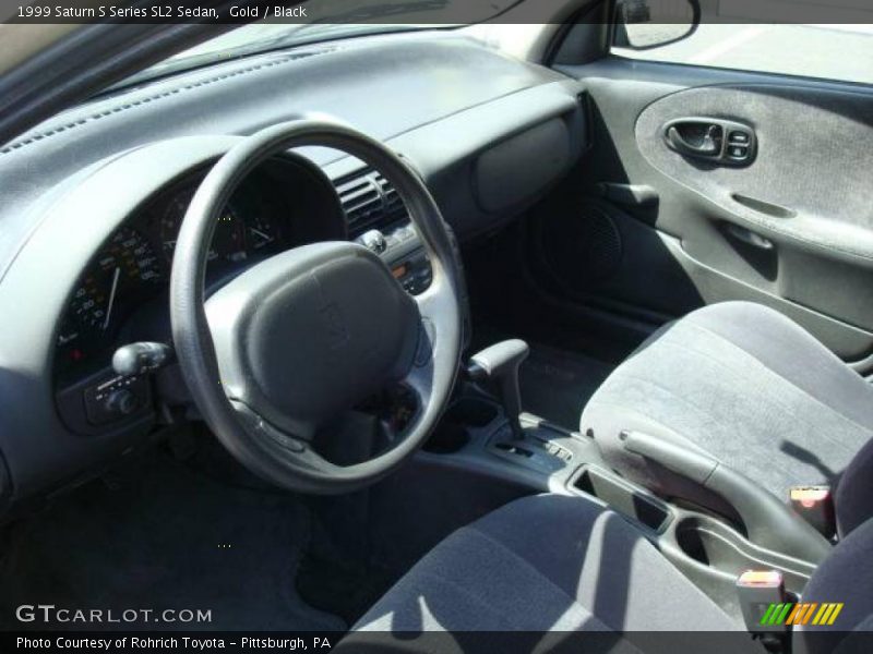 Gold / Black 1999 Saturn S Series SL2 Sedan