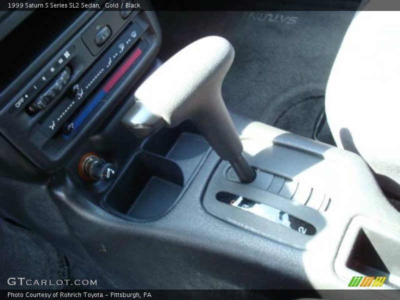 Gold / Black 1999 Saturn S Series SL2 Sedan