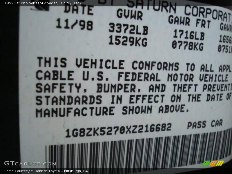 Gold / Black 1999 Saturn S Series SL2 Sedan