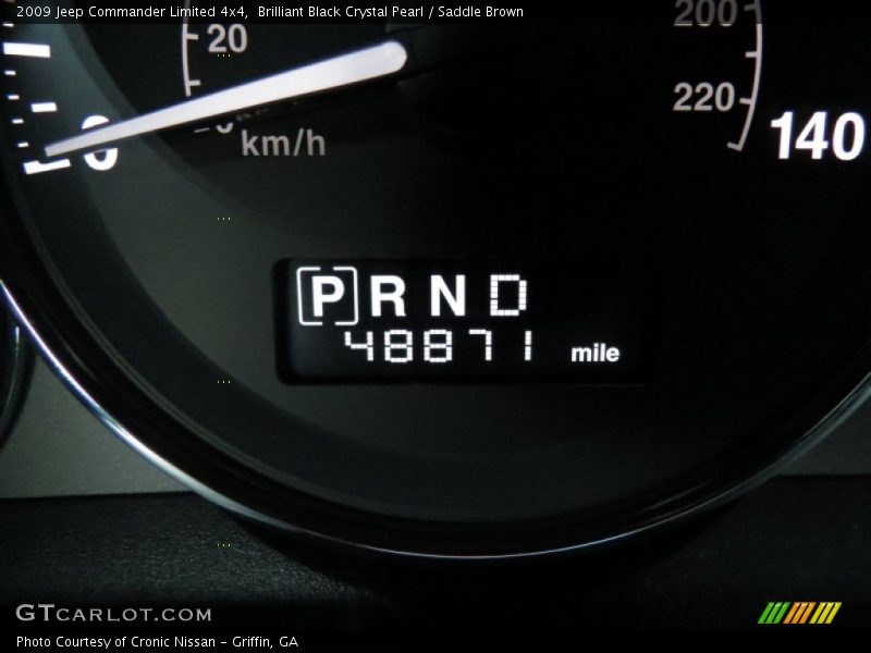 Brilliant Black Crystal Pearl / Saddle Brown 2009 Jeep Commander Limited 4x4
