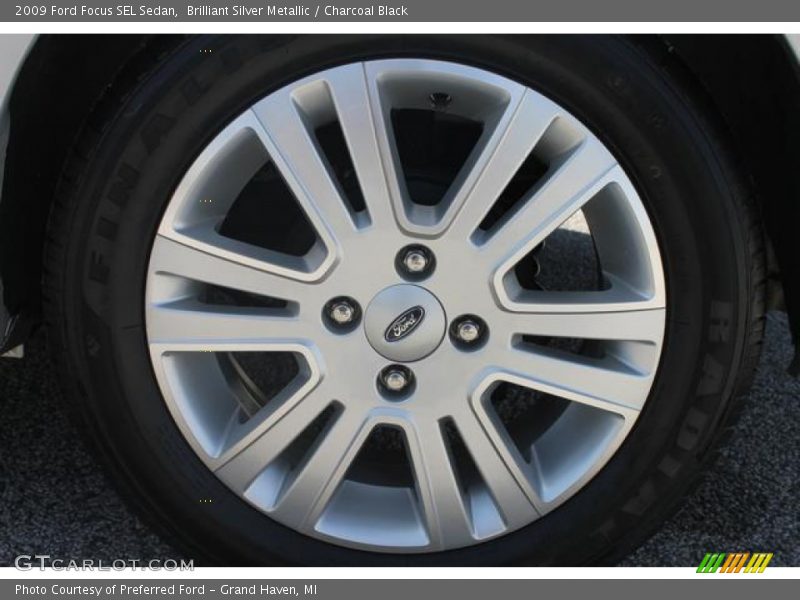Brilliant Silver Metallic / Charcoal Black 2009 Ford Focus SEL Sedan