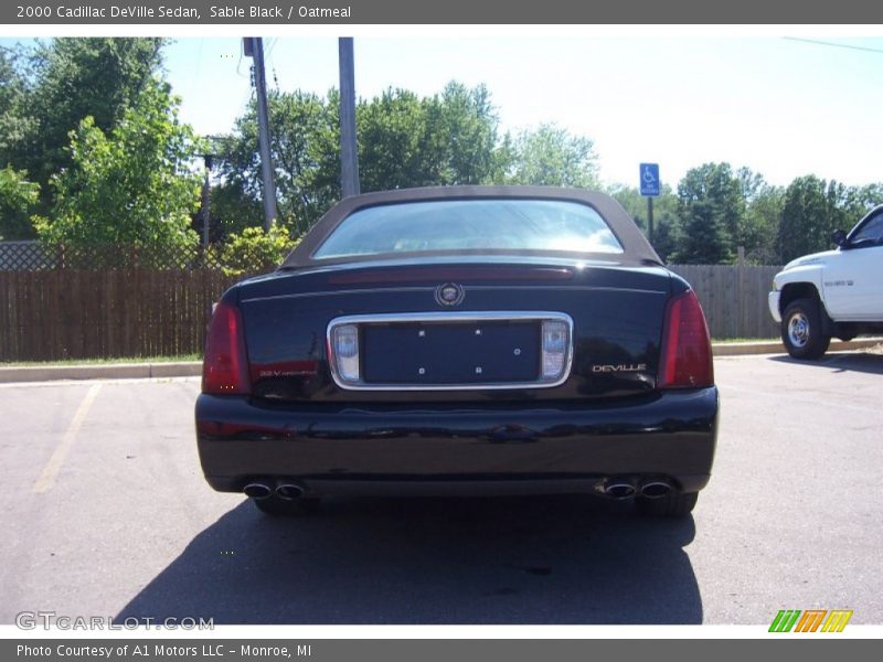 Sable Black / Oatmeal 2000 Cadillac DeVille Sedan