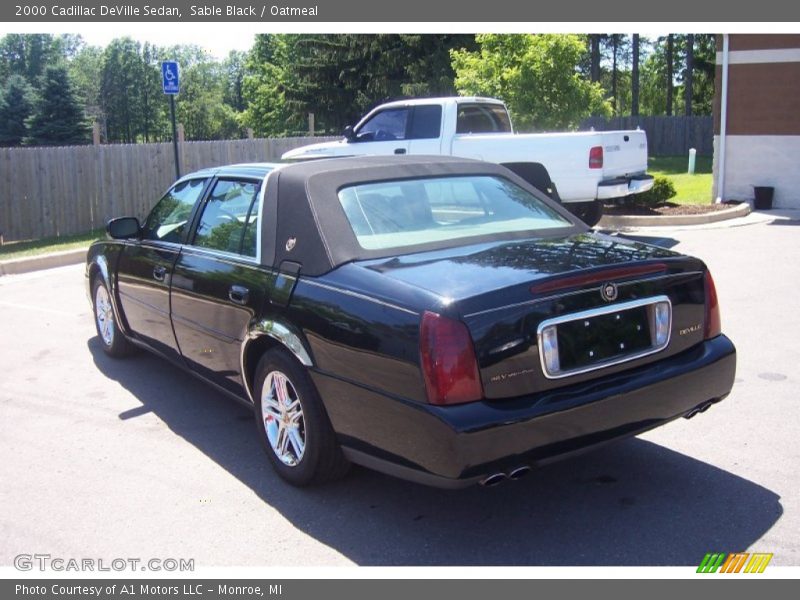 Sable Black / Oatmeal 2000 Cadillac DeVille Sedan