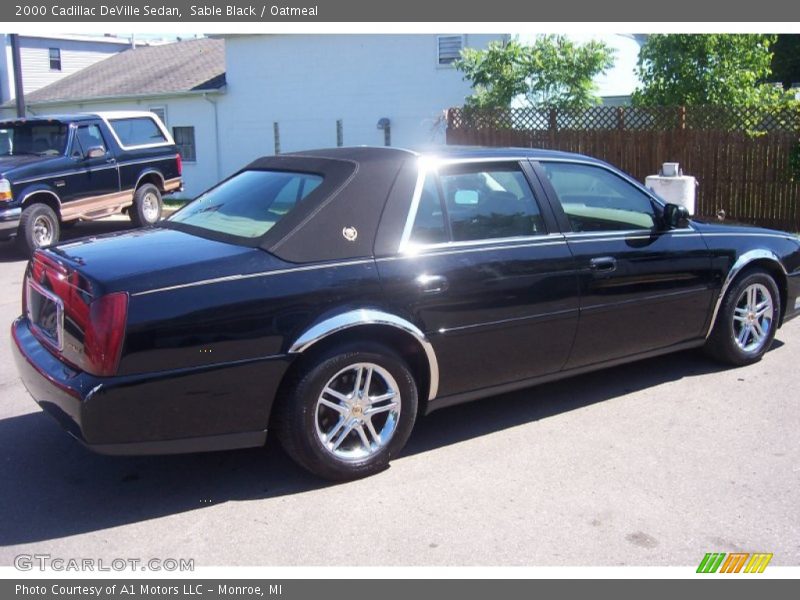 Sable Black / Oatmeal 2000 Cadillac DeVille Sedan