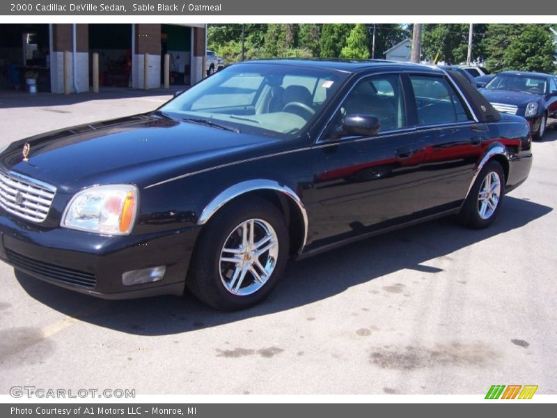 Sable Black / Oatmeal 2000 Cadillac DeVille Sedan
