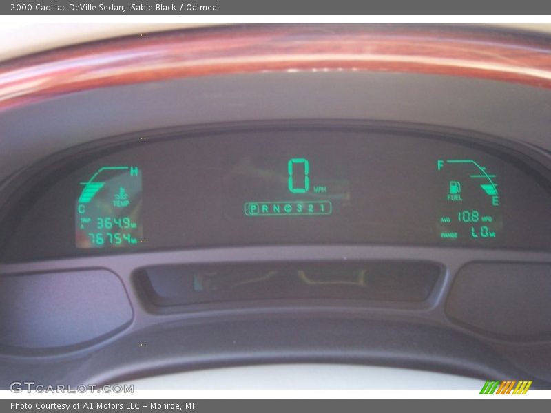 Sable Black / Oatmeal 2000 Cadillac DeVille Sedan