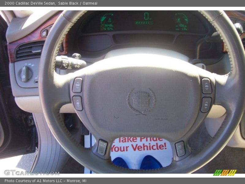 Sable Black / Oatmeal 2000 Cadillac DeVille Sedan