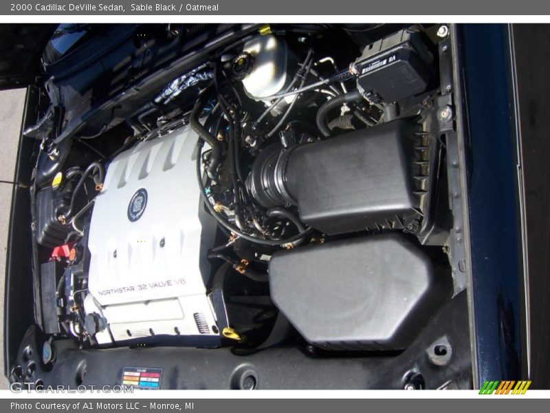 Sable Black / Oatmeal 2000 Cadillac DeVille Sedan