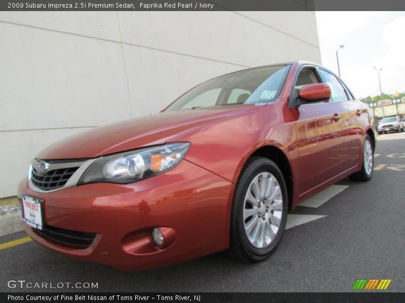 Paprika Red Pearl / Ivory 2009 Subaru Impreza 2.5i Premium Sedan