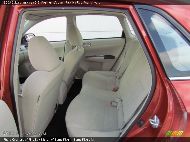 Paprika Red Pearl / Ivory 2009 Subaru Impreza 2.5i Premium Sedan