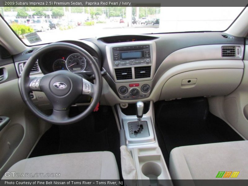 Paprika Red Pearl / Ivory 2009 Subaru Impreza 2.5i Premium Sedan