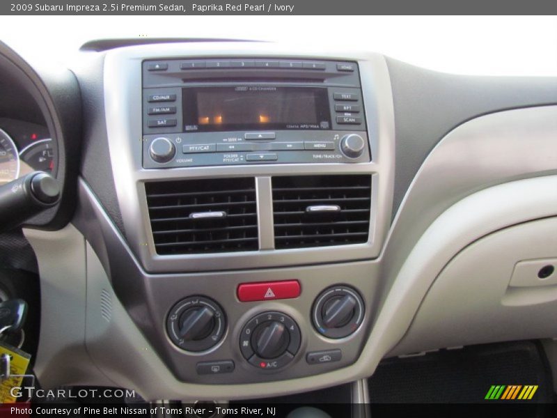 Paprika Red Pearl / Ivory 2009 Subaru Impreza 2.5i Premium Sedan