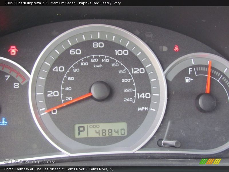 Paprika Red Pearl / Ivory 2009 Subaru Impreza 2.5i Premium Sedan