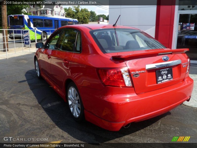 Lightning Red / Carbon Black 2008 Subaru Impreza WRX Sedan