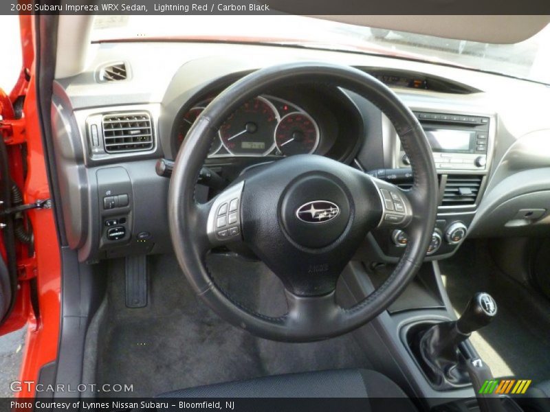 Lightning Red / Carbon Black 2008 Subaru Impreza WRX Sedan