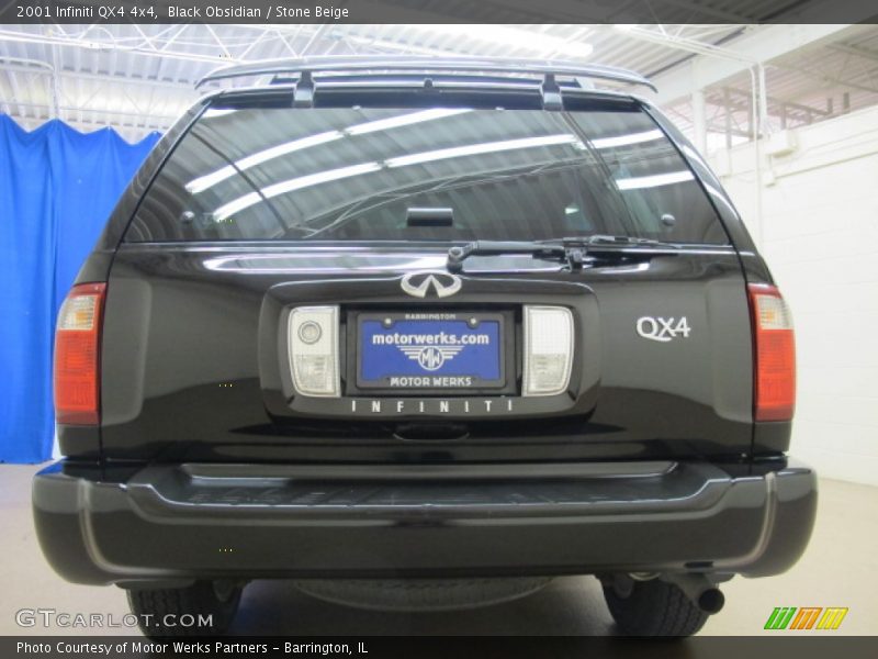 Black Obsidian / Stone Beige 2001 Infiniti QX4 4x4