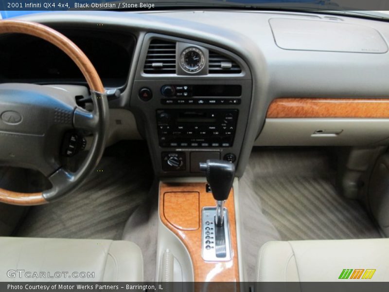 Black Obsidian / Stone Beige 2001 Infiniti QX4 4x4