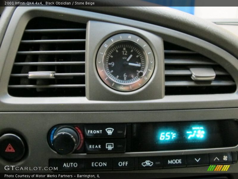 Black Obsidian / Stone Beige 2001 Infiniti QX4 4x4