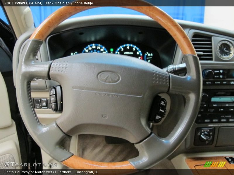 Black Obsidian / Stone Beige 2001 Infiniti QX4 4x4