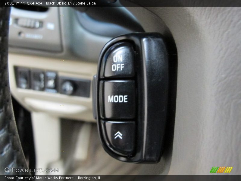 Black Obsidian / Stone Beige 2001 Infiniti QX4 4x4