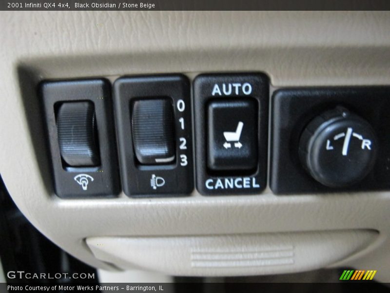 Black Obsidian / Stone Beige 2001 Infiniti QX4 4x4