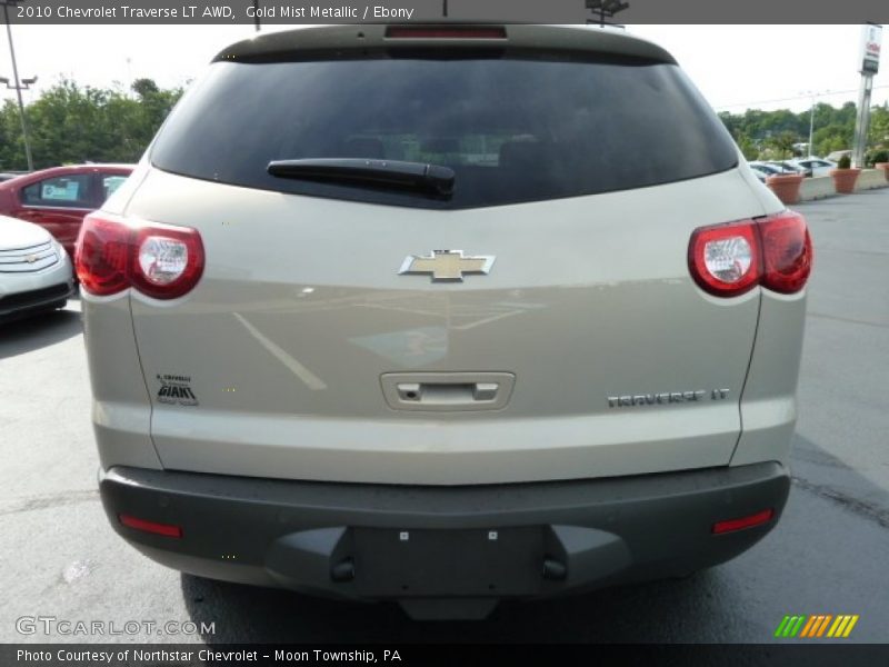 Gold Mist Metallic / Ebony 2010 Chevrolet Traverse LT AWD