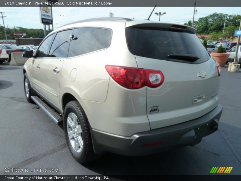 Gold Mist Metallic / Ebony 2010 Chevrolet Traverse LT AWD