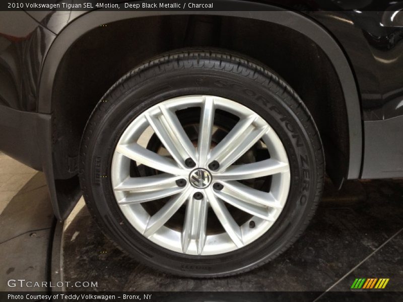 Deep Black Metallic / Charcoal 2010 Volkswagen Tiguan SEL 4Motion