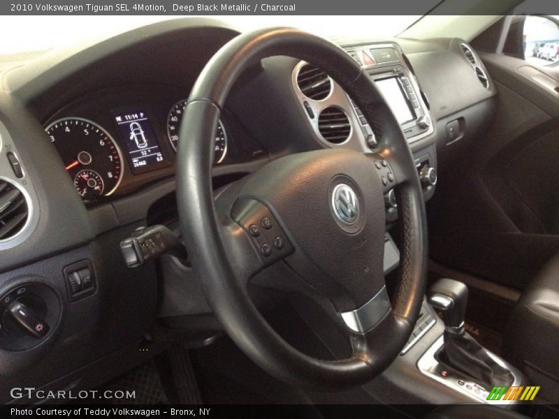 Deep Black Metallic / Charcoal 2010 Volkswagen Tiguan SEL 4Motion