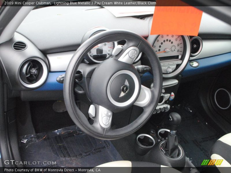 Lightning Blue Metallic / Ray Cream White Leather/Black Cloth 2009 Mini Cooper Clubman