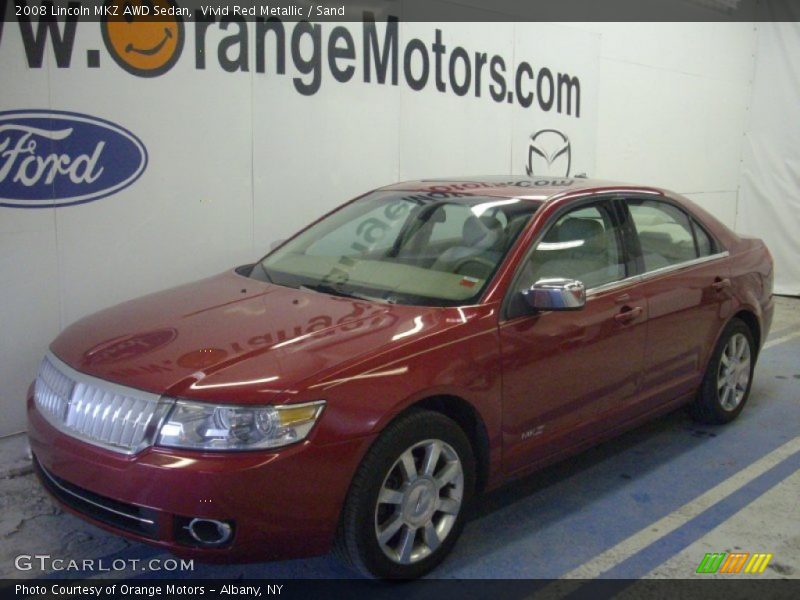 Vivid Red Metallic / Sand 2008 Lincoln MKZ AWD Sedan